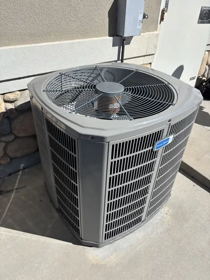 Residential air-conditioning condenser unit at a Utah home